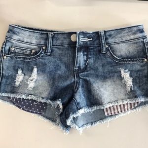 Jean shorts with red white and blue pockets